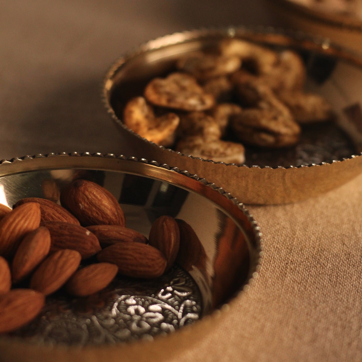brass plates with dry fruits