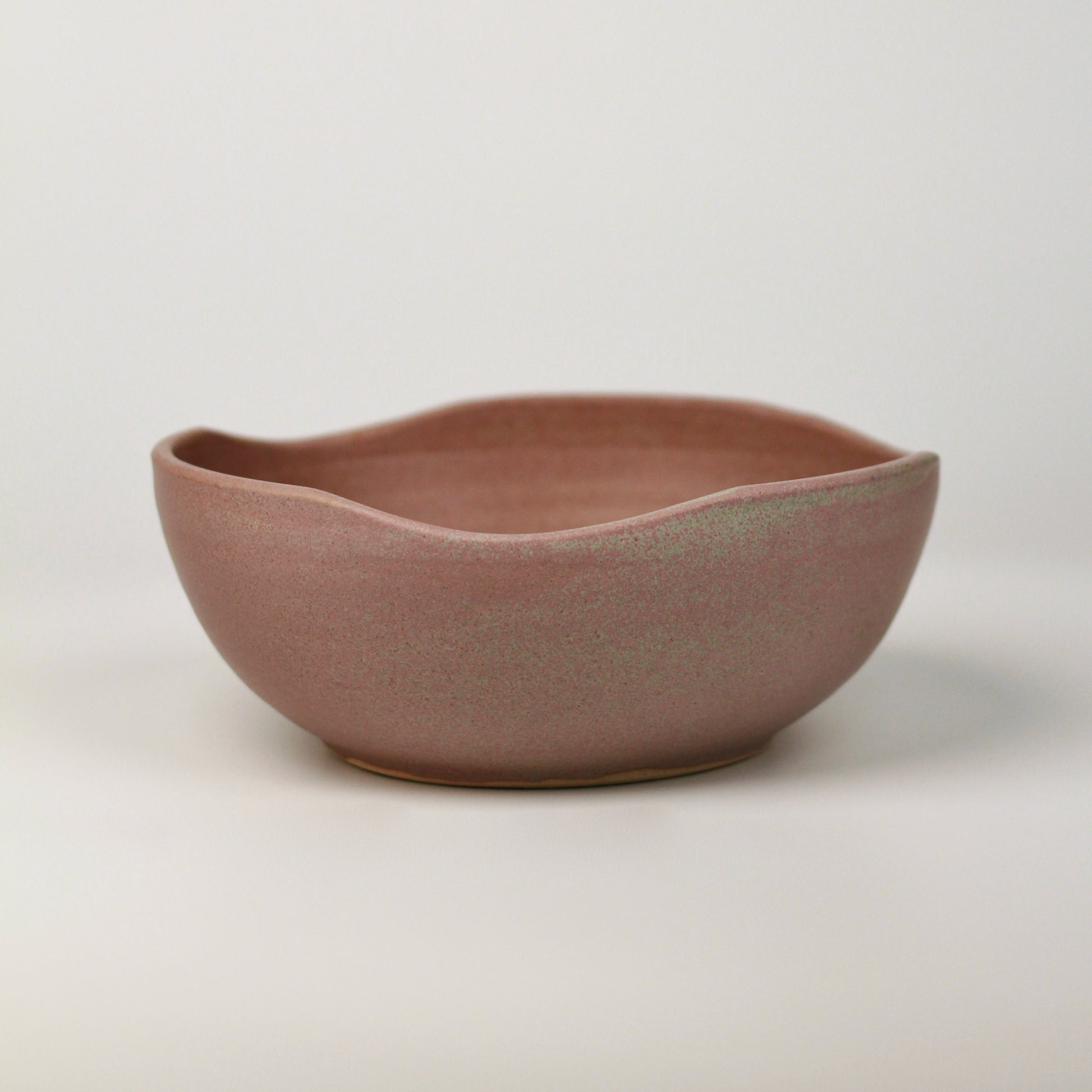 Decor ceramic bowl on a neutral background