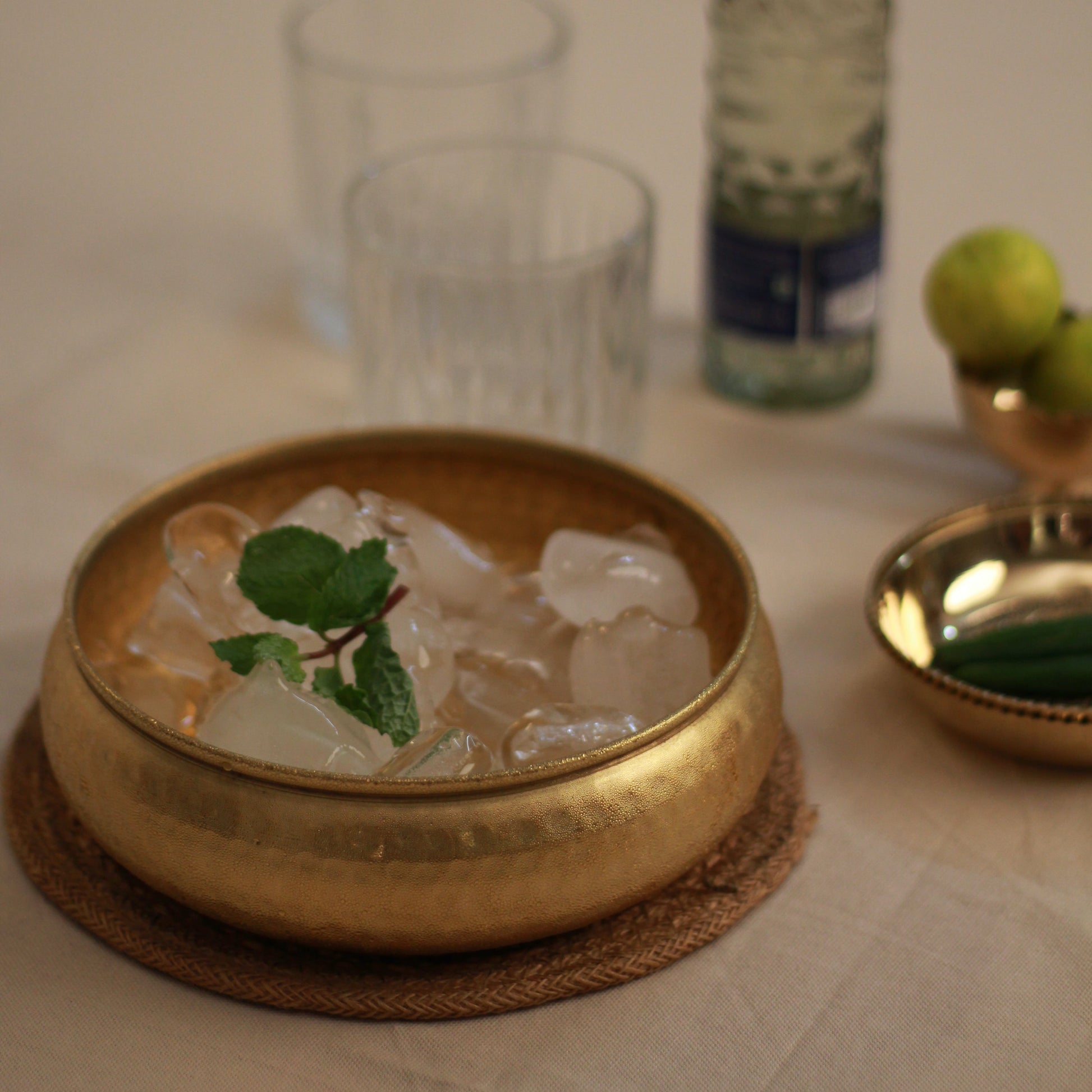 Taksh decor bowl holding ice cubes for cocktail setup 